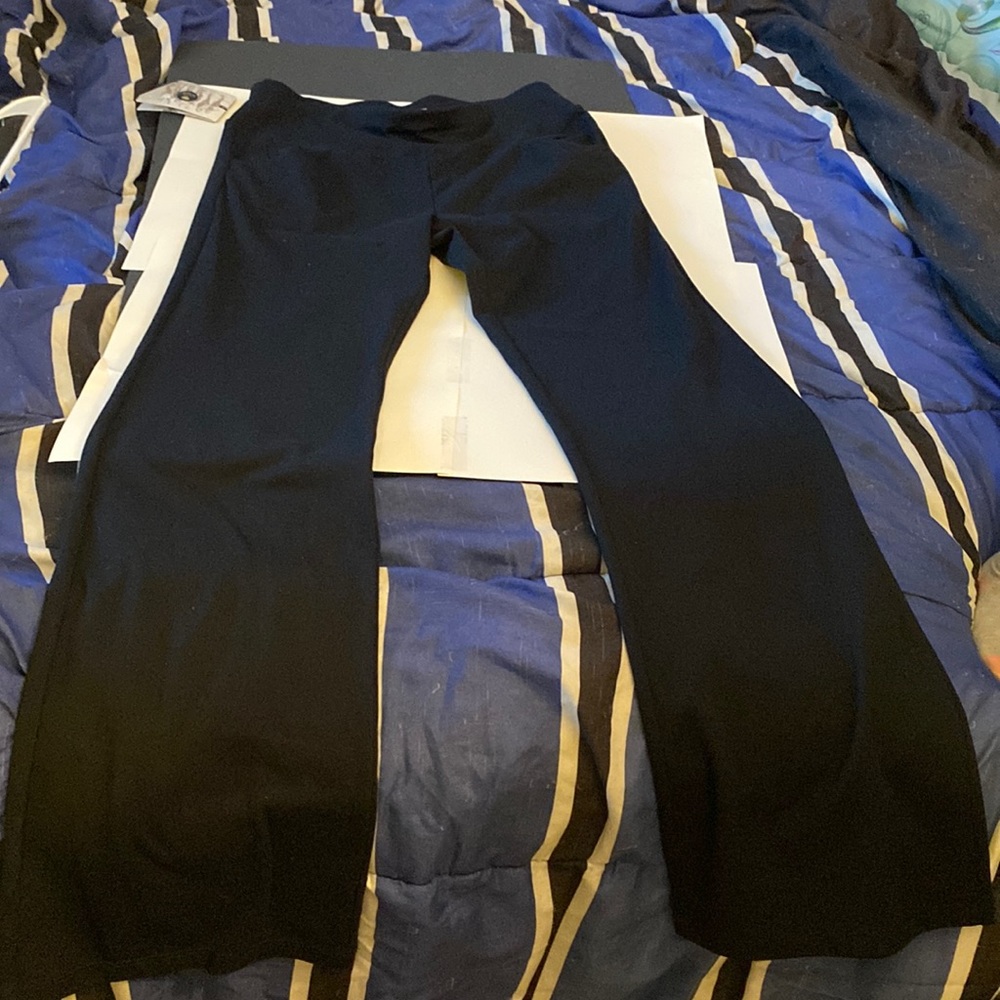 Brand: iuga. Black wide leg stretch pants. Never worn with tags. Size M.